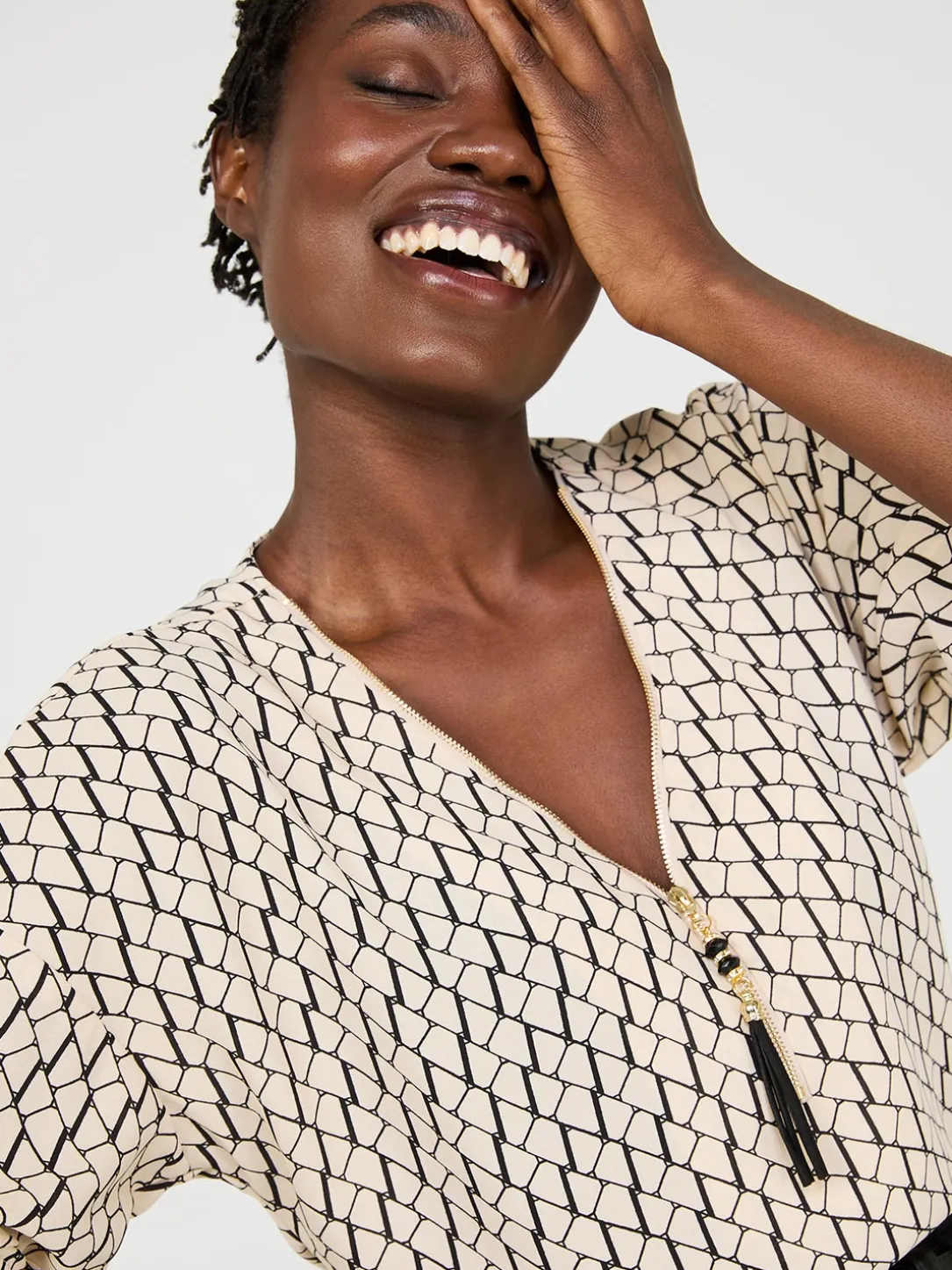 Geo Print Zip Front V-Neck Top