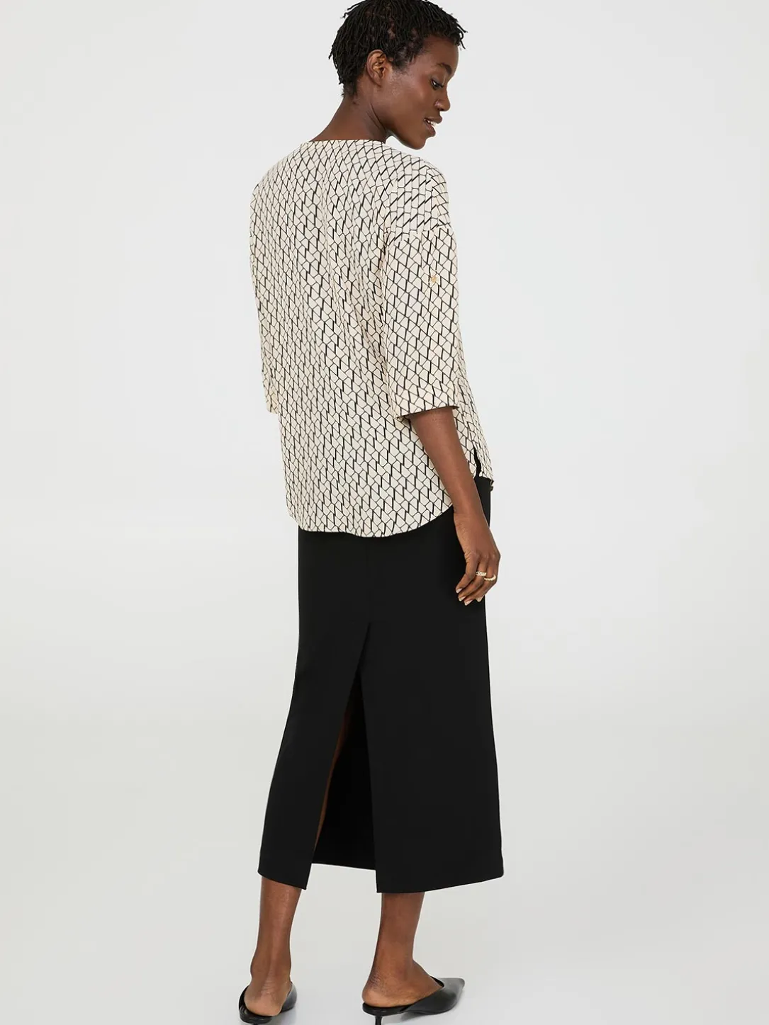 Geo Print Zip Front V-Neck Top